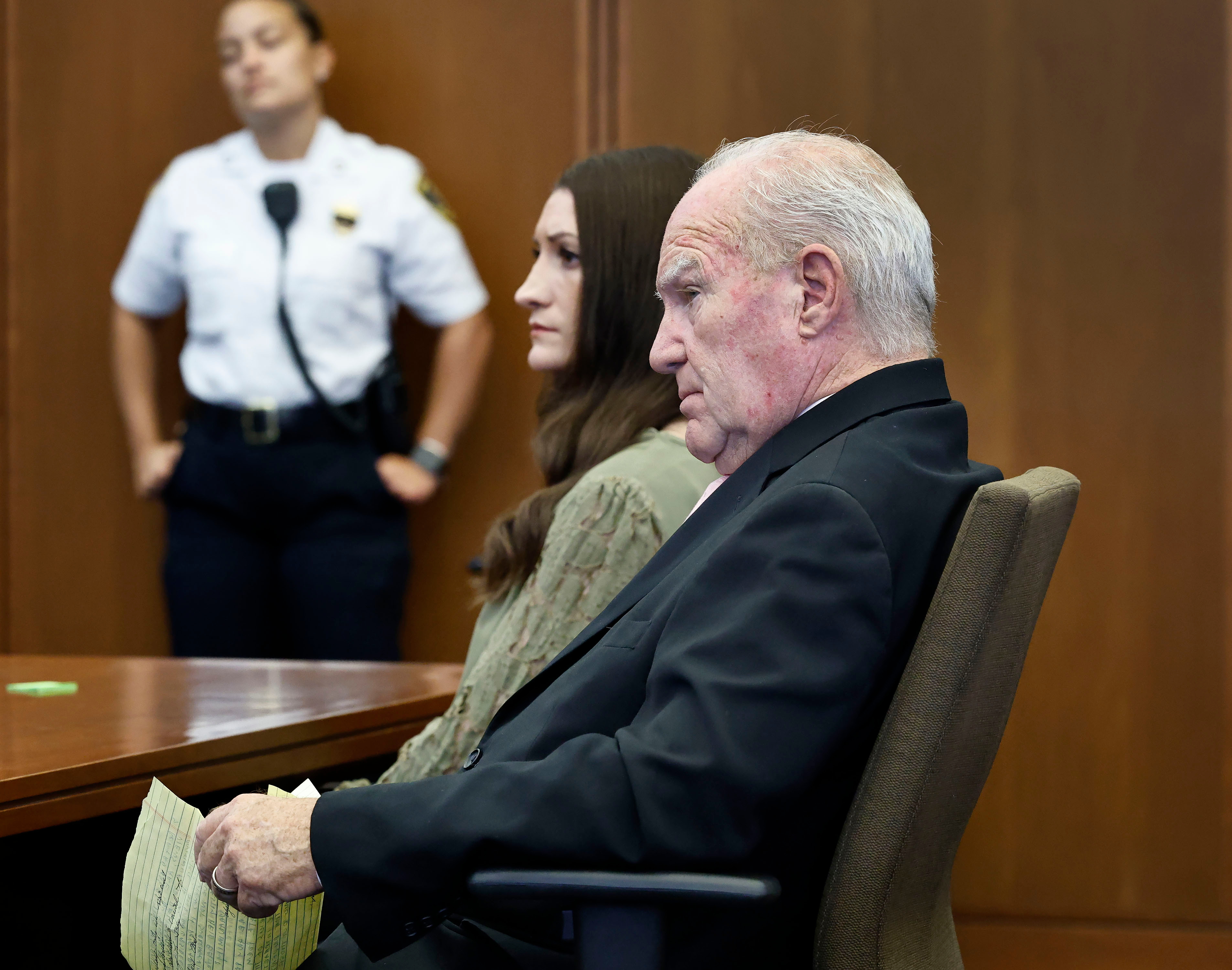 Lindsay Clancy and lawyer Kevin Reddington look at jurors as Judge William Sullivan instructs them to continue deliberations during Clancy